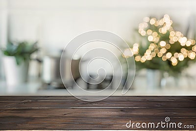 Christmas table background with christmas tree in kitchen out of focus. Background for display your products Stock Photo