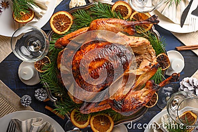 Christmas table, festive baked turkey, and served table. New Year Stock Photo