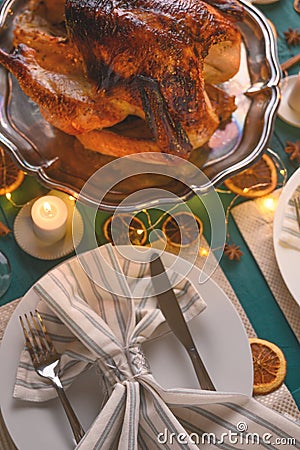 Christmas table, festive baked turkey, and served table. Vertical frame Stock Photo