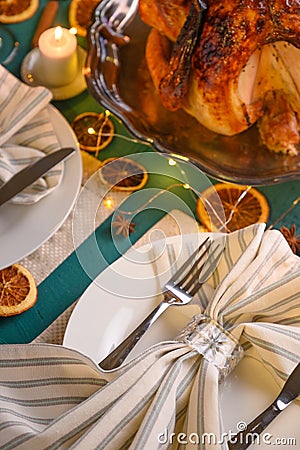 Christmas table, festive baked turkey, and served table. Vertical frame Stock Photo