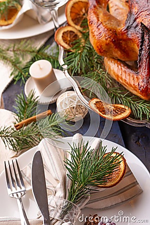 Christmas table, festive baked turkey, and served table. Vertical frame Stock Photo