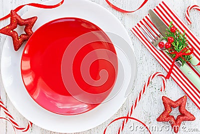 Christmas table place setting with empty red plate, christmas de Stock Photo