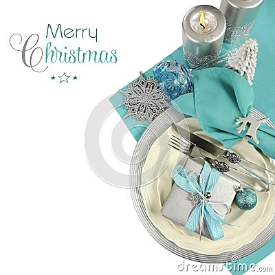 Christmas table place settings in aqua blue, silver and white Stock Photo