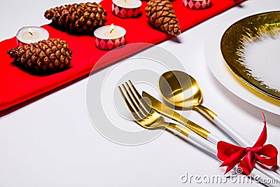 Christmas laying table appointments, table setting options. Silverware, tableware items with festive decoration Stock Photo