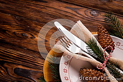 Christmas laying table appointments, table setting options. Silverware, tableware items with festive decoration Stock Photo