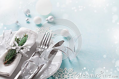 Christmas table setting for holiday dinner. Bokeh effect. Empty space for menu Stock Photo