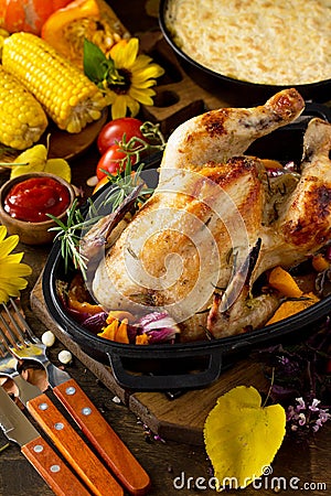 Christmas or Thanksgiving Homemade Roasted Turkey, Potato Gratin and grill Corn Stock Photo