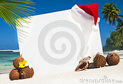 Christmas Themed Board On The Beach Stock Photo