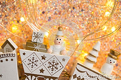 Christmas toy made of wood. New year train with miniature gifts decorated with winter ornaments close-up Stock Photo