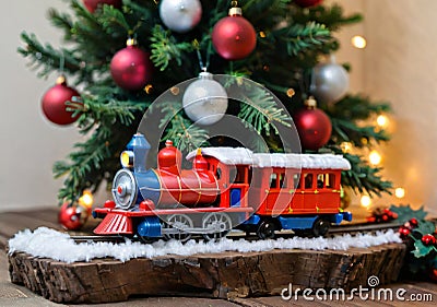 A Christmas Toy Train Under A Tree, With A Front Angle. Generative AI Stock Photo