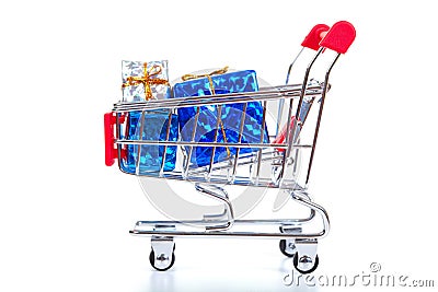 Christmas toys in shopping cart Stock Photo