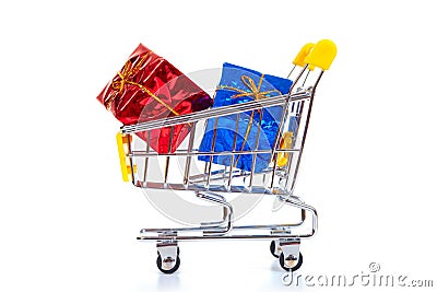 Christmas toys in shopping cart Stock Photo