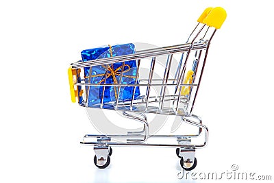 Christmas toys in shopping cart Stock Photo