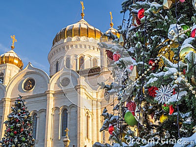 Christmas tree against the backdrop of the Cathedral of Christ the Savior Editorial Stock Photo