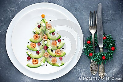 Christmas tree appetizer avocado salmon salad tartare ceviche Stock Photo