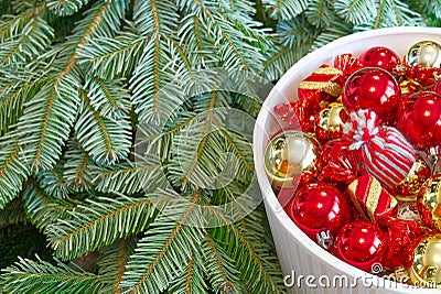 Christmas tree branches and Christmas decorations. Red balls and christmas tree branch Stock Photo