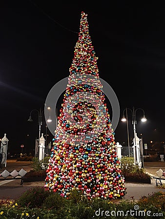 Christmas tree decorated entirely of colored balls Stock Photo