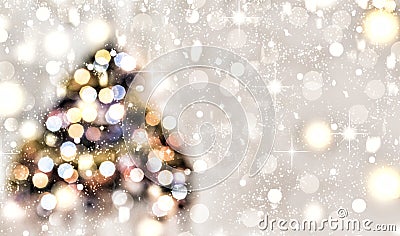 Christmas tree decorated with multicolored lights on a background of falling snow, golden snowflakes. Christmas background. Abstra Stock Photo