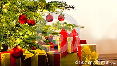 Christmas tree decorated with presents Stock Photo