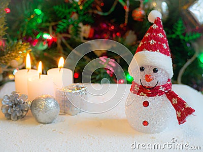 Christmas tree with decoration and candle and snow man Stock Photo