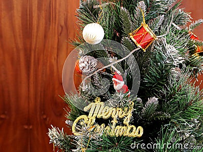 Christmas Tree Decorations with Santa and merry Christmas Text Sign - Christmas Card Design Stock Photo