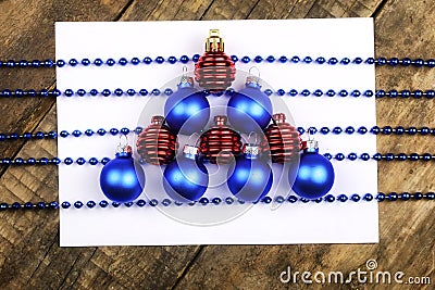 Christmas tree decorations on the table and sheet with music not Stock Photo