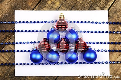 Christmas tree decorations on the table and sheet with music not Stock Photo