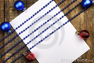 Christmas tree decorations on the table and sheet with music not Stock Photo