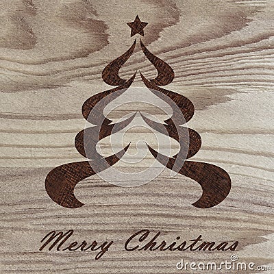 Christmas tree engraved on wood with pyrography technique. Hobby. DIY. Do it yourserlf Stock Photo