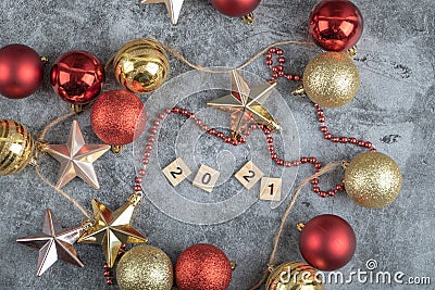 Christmas tree figures with 2021 writing across them on the grey marble Stock Photo