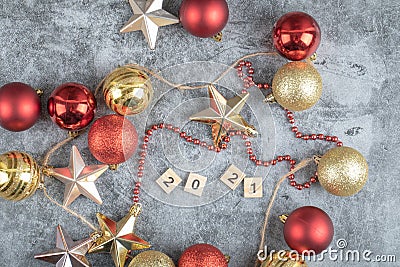 Christmas tree figures with 2021 writing across them on the grey marble Stock Photo