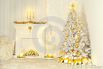 Christmas Tree and Fireplace, Gold Color Decorated Room Interior Stock Photo