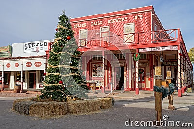 Christmas tree in front of western building in Tombstone Arizona Editorial Stock Photo