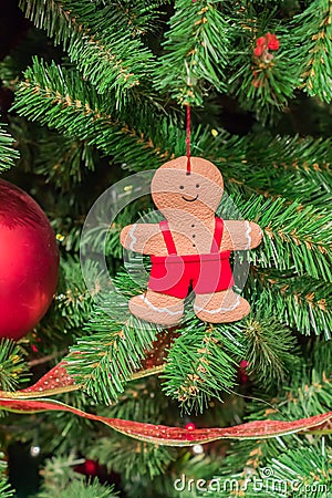 Christmas tree with garland and gingerbread man Stock Photo