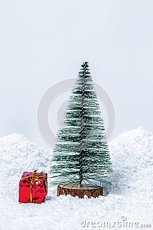 Christmas tree with gifts in snow drift. Free space for your text Stock Photo