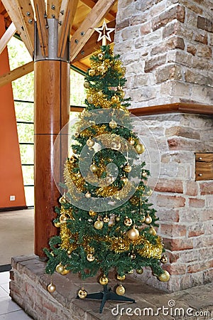 Christmas tree in golden tones Stock Photo