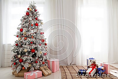 Christmas Tree House Interior new year holiday gifts winter Stock Photo