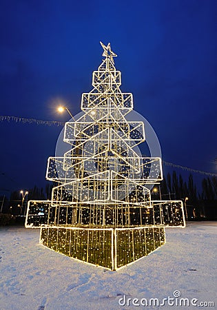 Christmas tree illuminated outdoor in the night Stock Photo