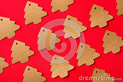 Christmas tree label pattern on red background Stock Photo