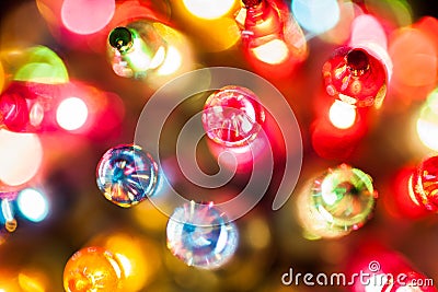 Christmas tree lights bulbs closeup on bokeh colorful Stock Photo