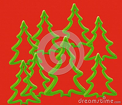 Christmas tree molds on a red canvas background Stock Photo