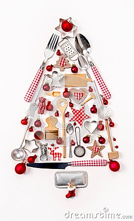 Christmas tree of old and antique miniatures in red, silver and Stock Photo