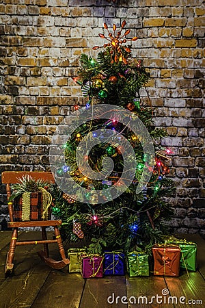 Christmas Tree and Red Rocking Chair Stock Photo