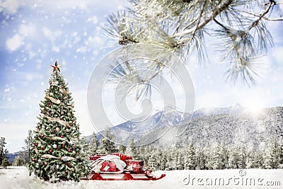 Snowy Outdoor Christmas Tree Scene in Mountains Stock Photo