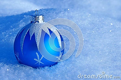 Christmas tree toy in the snow Stock Photo
