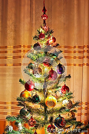 Christmas tree with Christmas toys. Christmas tree lights Stock Photo