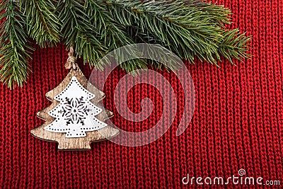 Christmas tree traditional decoration on red wool background Stock Photo