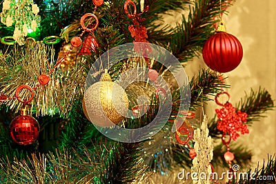 Christmas tree with various decorations and tinsel. Stock Photo