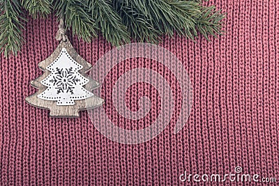 Christmas tree vintage background. Red wool fabric pale color Stock Photo