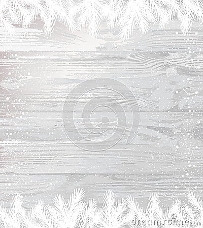 Christmas white wooden background with winter fir branches with snowflakes, light. Stock Photo